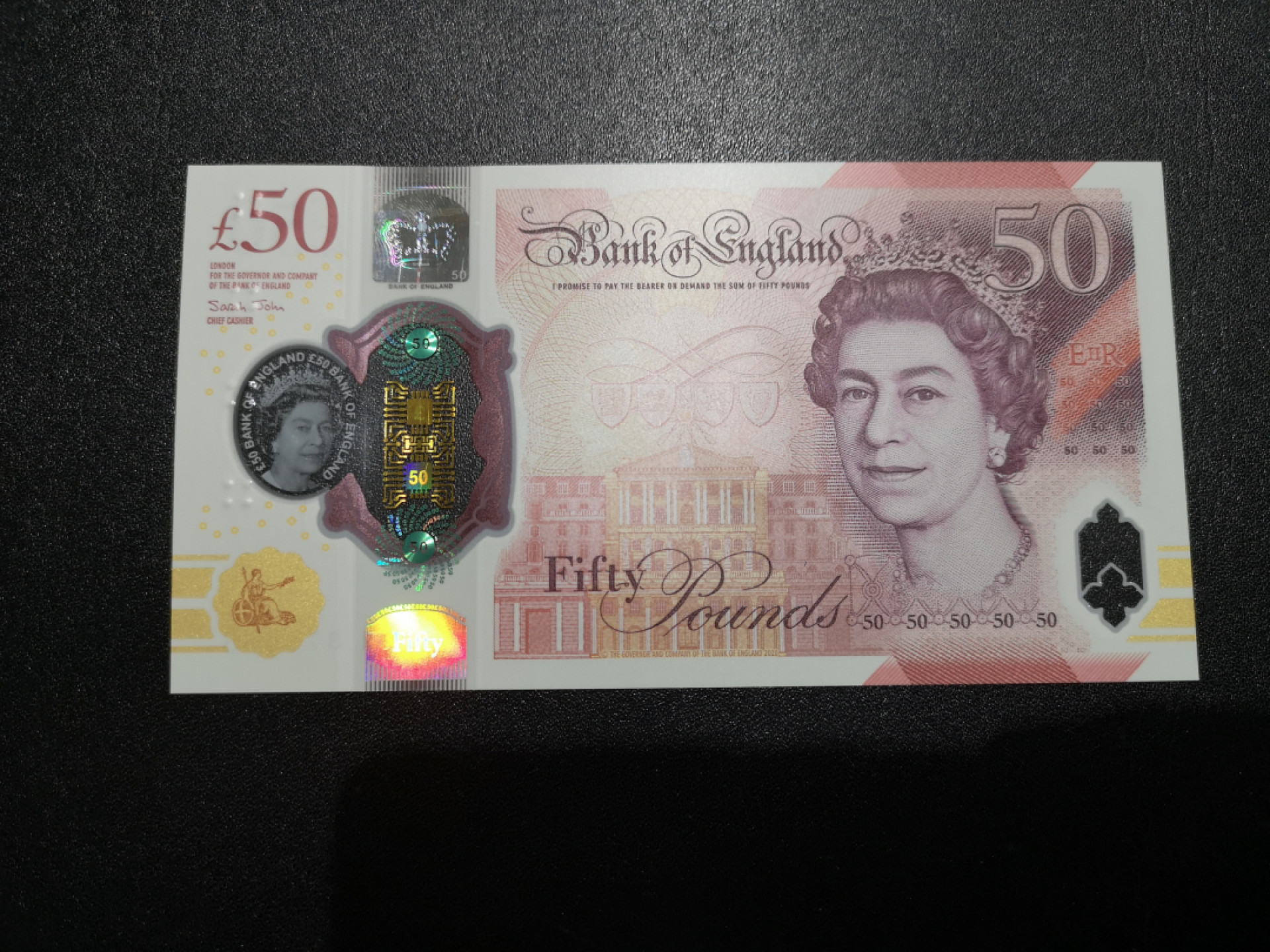 《外钞收藏家》第一百五十八期拍卖（本期111件） 英国最新版塑料钞50镑 首发冠AA01 全新UNC
