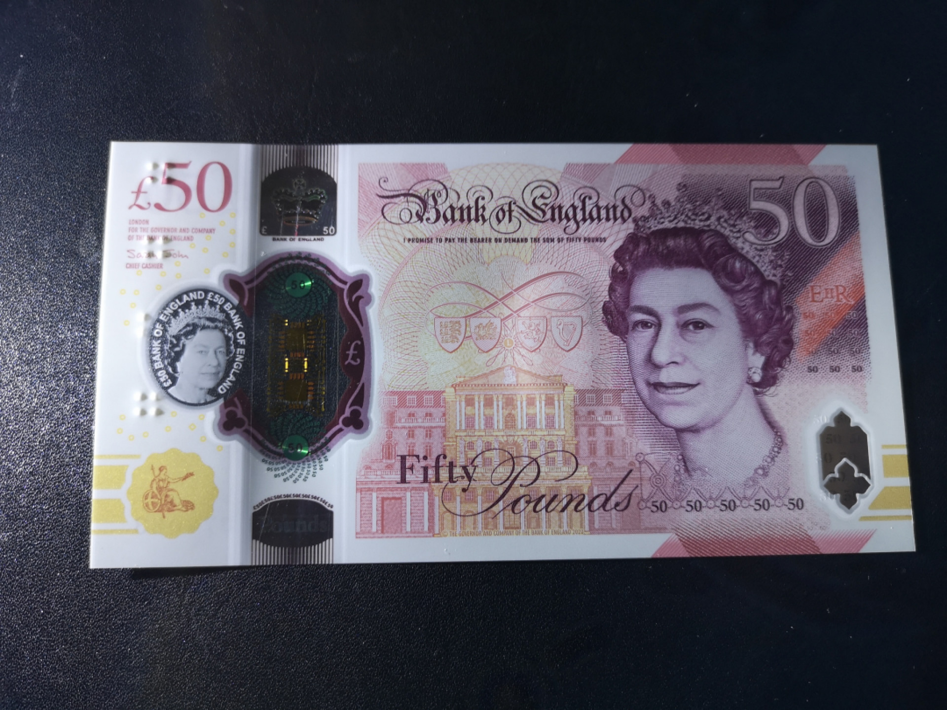 《外钞收藏家》第一百五十八期拍卖（本期111件） 英国最新版塑料钞50镑 首发冠AA01 全新UNC