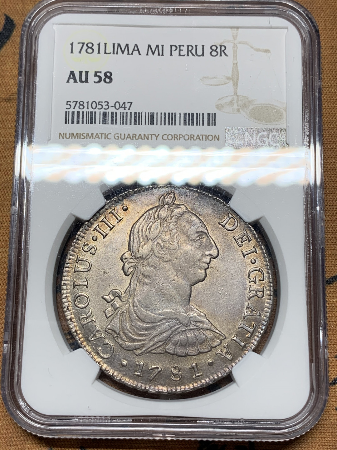《竞宝斋》钱币微拍-第24场-本周日，周一2场连拍（全场顺丰包邮） 亚军 NGC-AU58 西属秘鲁 1781年 卡洛斯三世 8R 老双柱 大银币淡彩包浆 顶级品相