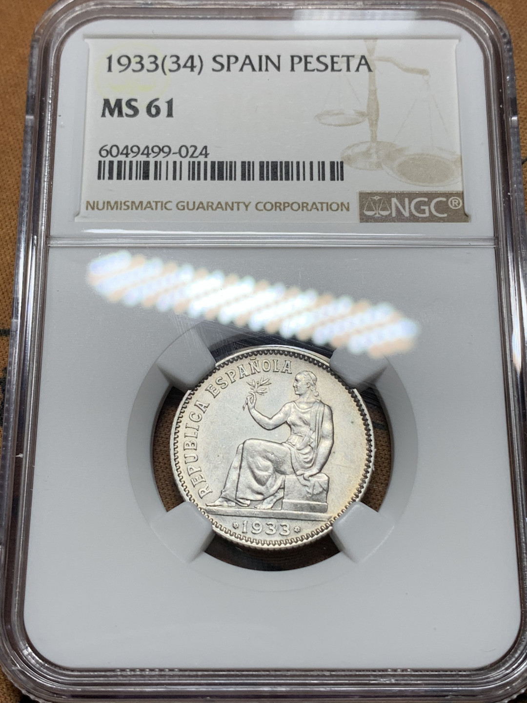 《竞宝斋》钱币微拍-第24场-本周日，周一2场连拍（全场顺丰包邮） NGC MS61 1933（34）版 西班牙 内战版 1比塞塔银币 只能说评级好严