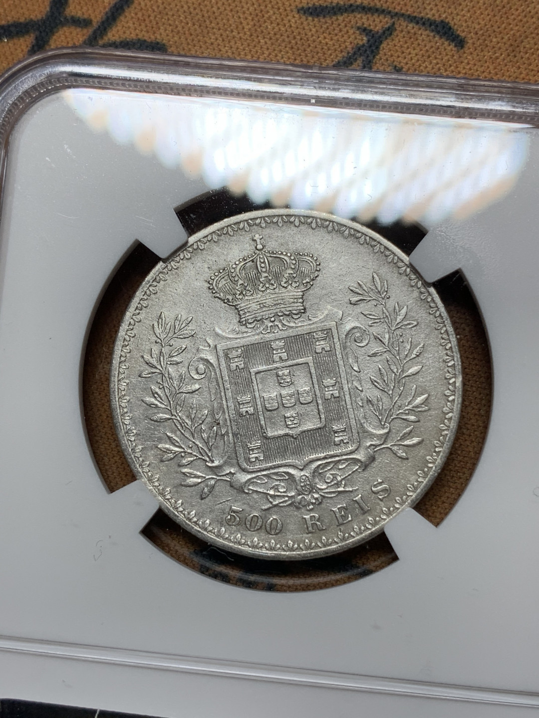 《竞宝斋》钱币微拍-第24场-本周日，周一2场连拍（全场顺丰包邮） NGC 评级 葡萄牙1893年 卡洛斯一世 500瑞斯 银币 半元型 发丝清晰 正面光度十足背面原味包浆