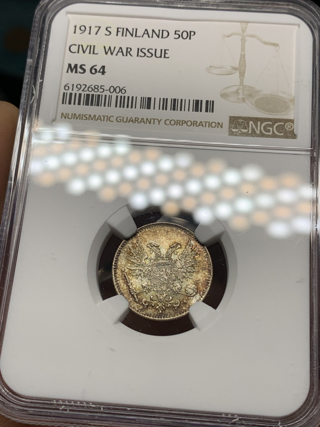 《竞宝斋》钱币微拍-第24场-本周日，周一2场连拍（全场顺丰包邮） NGC-MS64 俄属芬兰 1917年 双头鹰 50分 银币 淡彩包浆顶级品相