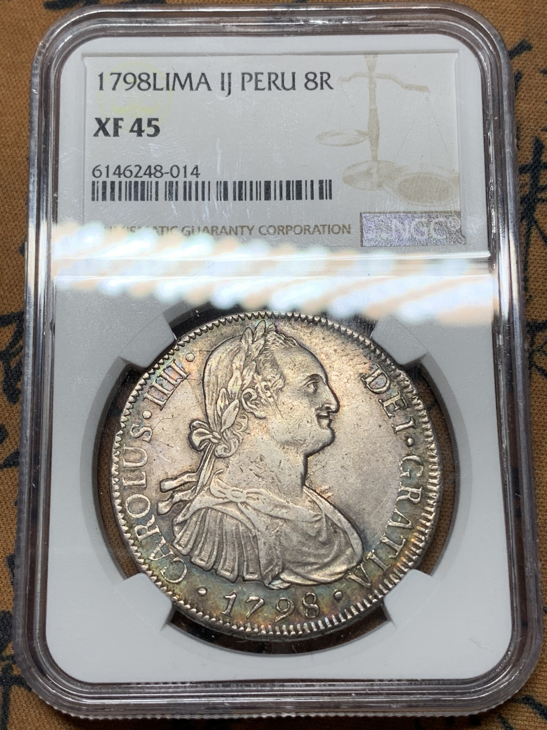 《竞宝斋》钱币微拍-第24场-本周日，周一2场连拍（全场顺丰包邮） NGC-XF45  1798  西属秘鲁利马 卡四  稀少厂  8里亚尔  原味五彩  是非难得 低评