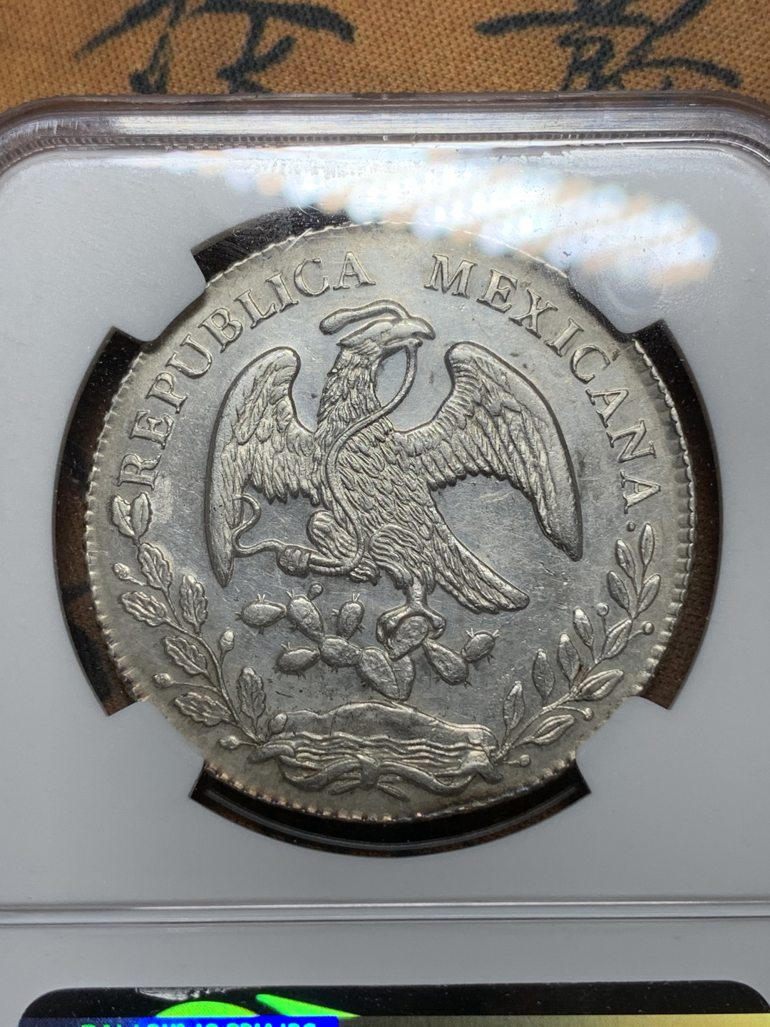 《竞宝斋》钱币微拍-第24场-本周日，周一2场连拍（全场顺丰包邮） NGC-UNCD   墨西哥 1874年 8 里亚尔   墨西哥厂  银币     原味mo厂老鹰 