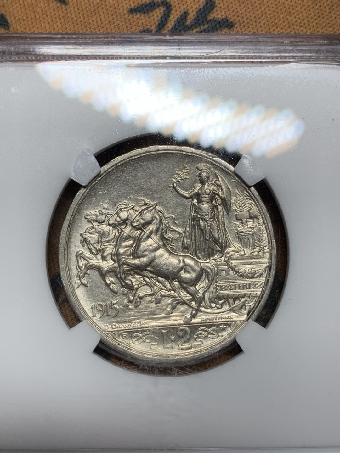 《竞宝斋》钱币微拍-第24场-本周日，周一2场连拍（全场顺丰包邮） NGC-MS61 意大利 1915年胜利马车 2里拉 银币 原光好品