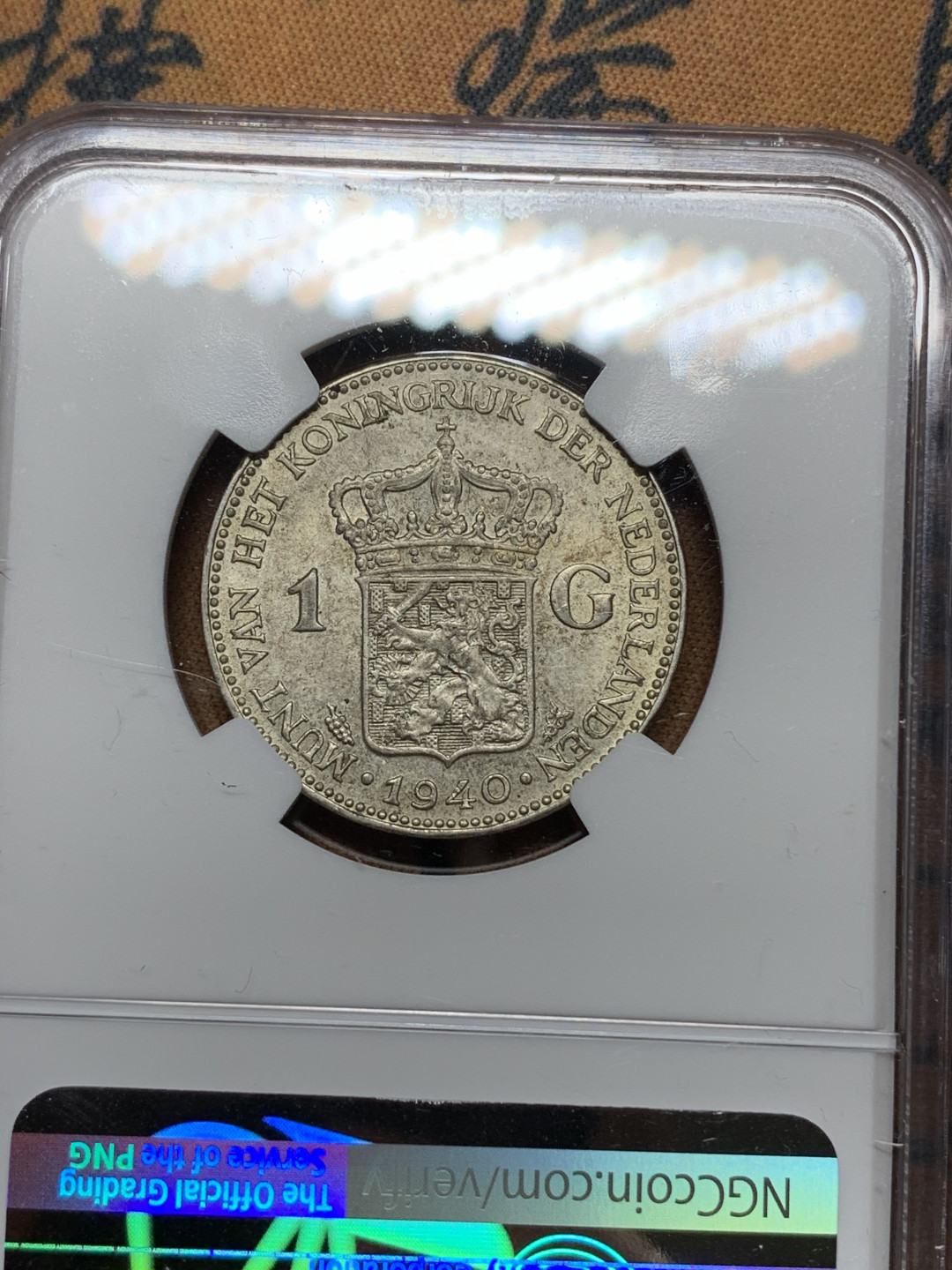 《竞宝斋》钱币微拍-第24场-本周日，周一2场连拍（全场顺丰包邮） NGC-MS62 荷兰 1940年 威廉米娜女王 1盾 银币 原光好品