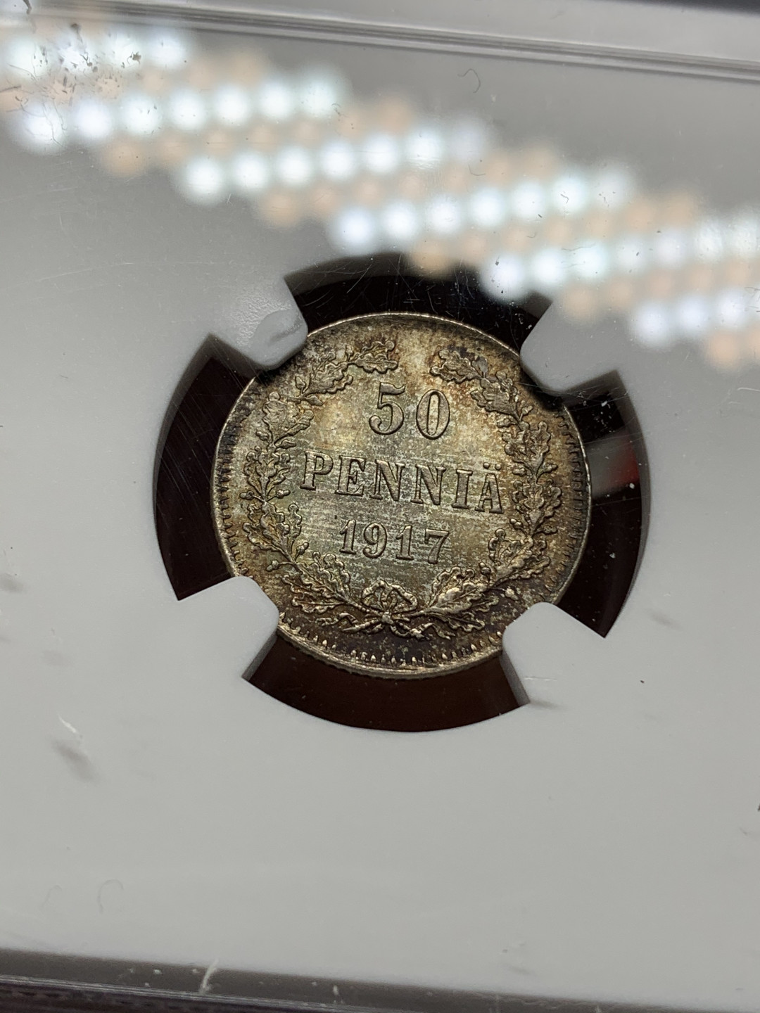 《竞宝斋》钱币微拍-第24场-本周日，周一2场连拍（全场顺丰包邮） NGC-MS64 俄属芬兰 1917年 双头鹰 50分 银币 淡彩包浆顶级品相