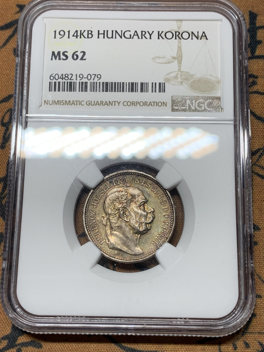 《竞宝斋》钱币微拍-第24场-本周日，周一2场连拍（全场顺丰包邮） NGC-MS62 匈牙利 1914 年 KB版 1克朗银币 双面酱彩 实为难得