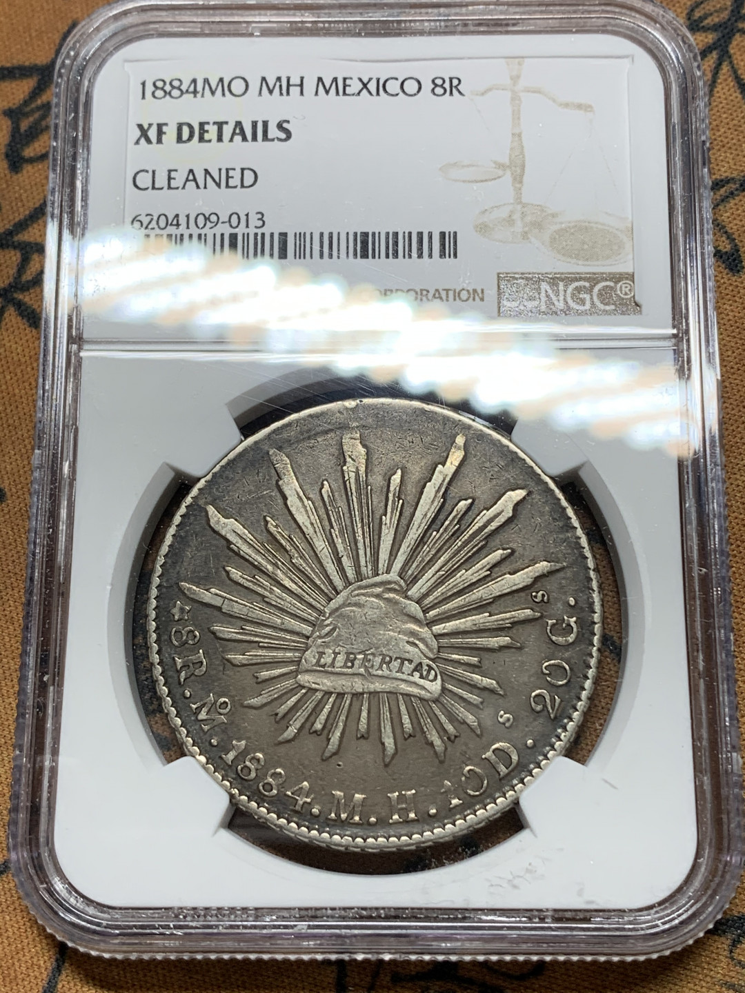 《竞宝斋》钱币微拍-第24场-本周日，周一2场连拍（全场顺丰包邮） NGC-XFD  1884 墨西哥鹰洋 8 里亚尔 墨西哥城厂  黑包浆