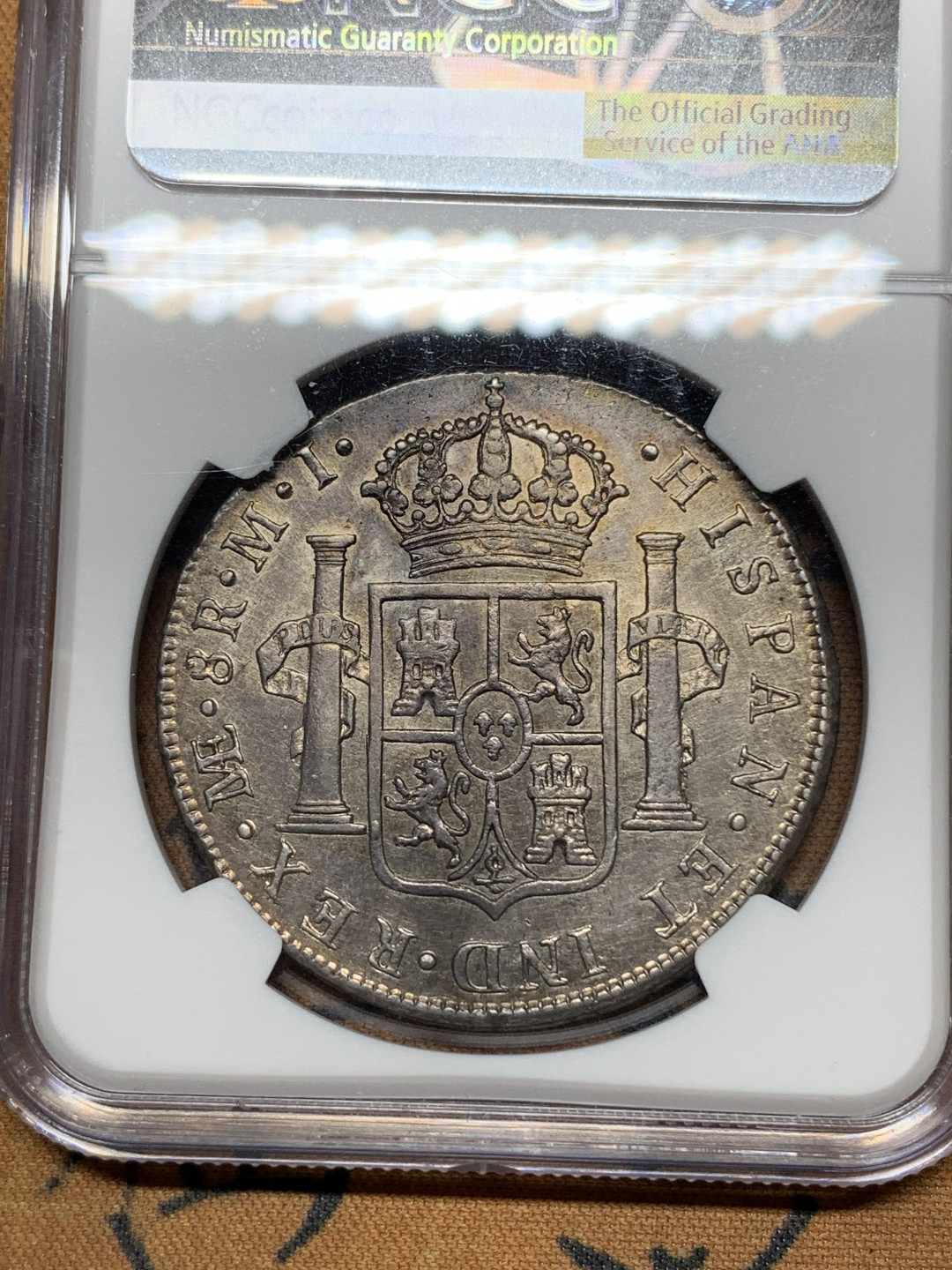 《竞宝斋》钱币微拍-第24场-本周日，周一2场连拍（全场顺丰包邮） 亚军 NGC-AU58 西属秘鲁 1781年 卡洛斯三世 8R 老双柱 大银币淡彩包浆 顶级品相