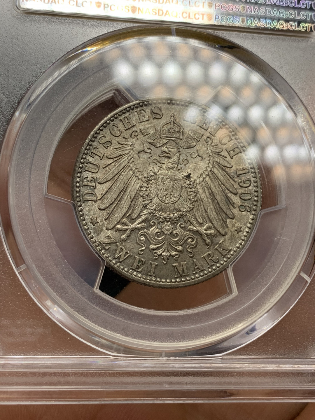 《竞宝斋》钱币微拍-第24场-本周日，周一2场连拍（全场顺丰包邮） PCGS-MS65 德国巴登 1906年 金婚 2马克 银币 淡彩老包浆 值得收藏