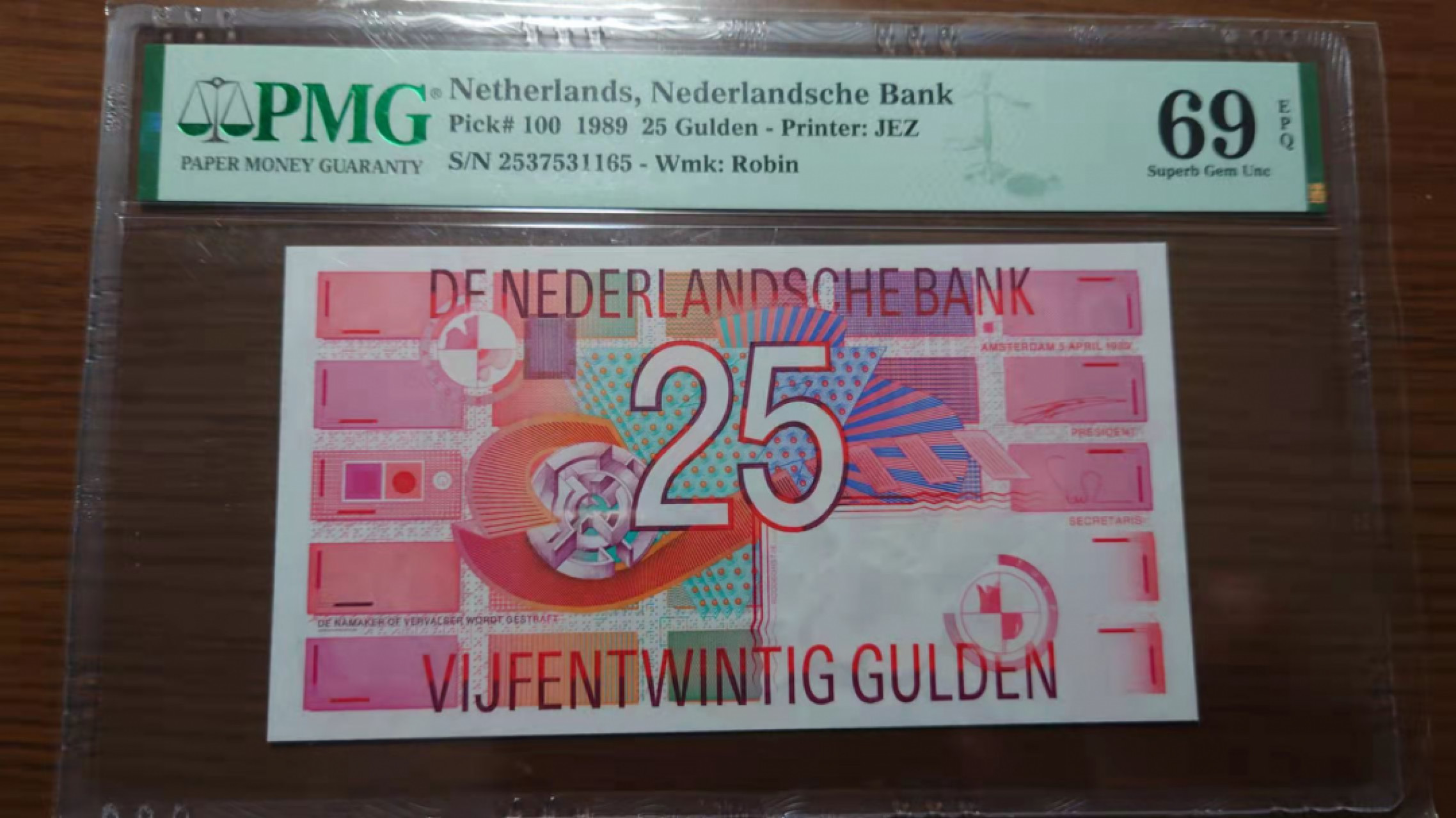今晚八点半【囧羊收藏】精选微拍第43期暨2021年第三十四期 世界纸币精选 1989年荷兰25盾 齿轮版 PMG69E高分 全新全程无4尾号1165