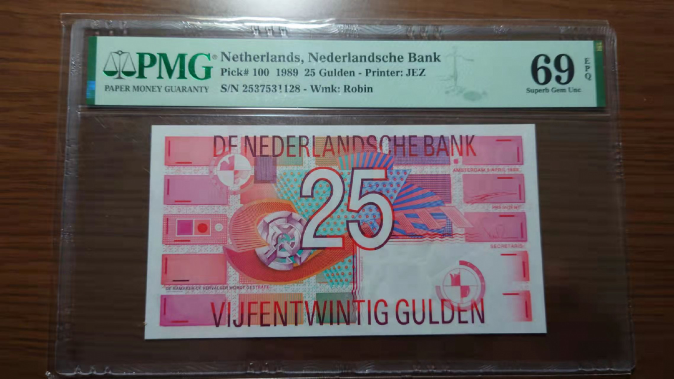 今晚八点半【囧羊收藏】精选微拍第43期暨2021年第三十四期 世界纸币精选 1989年荷兰25盾 齿轮版 PMG69E高分 全新全程无4尾号1128