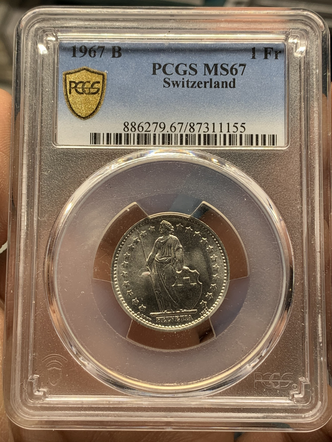 《竞宝斋》钱币微拍-第25场-本周日，周一2场连拍（全场顺丰包邮） PCGS-MS67 瑞士 1967B 1法郎 女神 银币 转光强烈 构图精美 高分小辅币，关门银币 背部左上角支撑位置有损