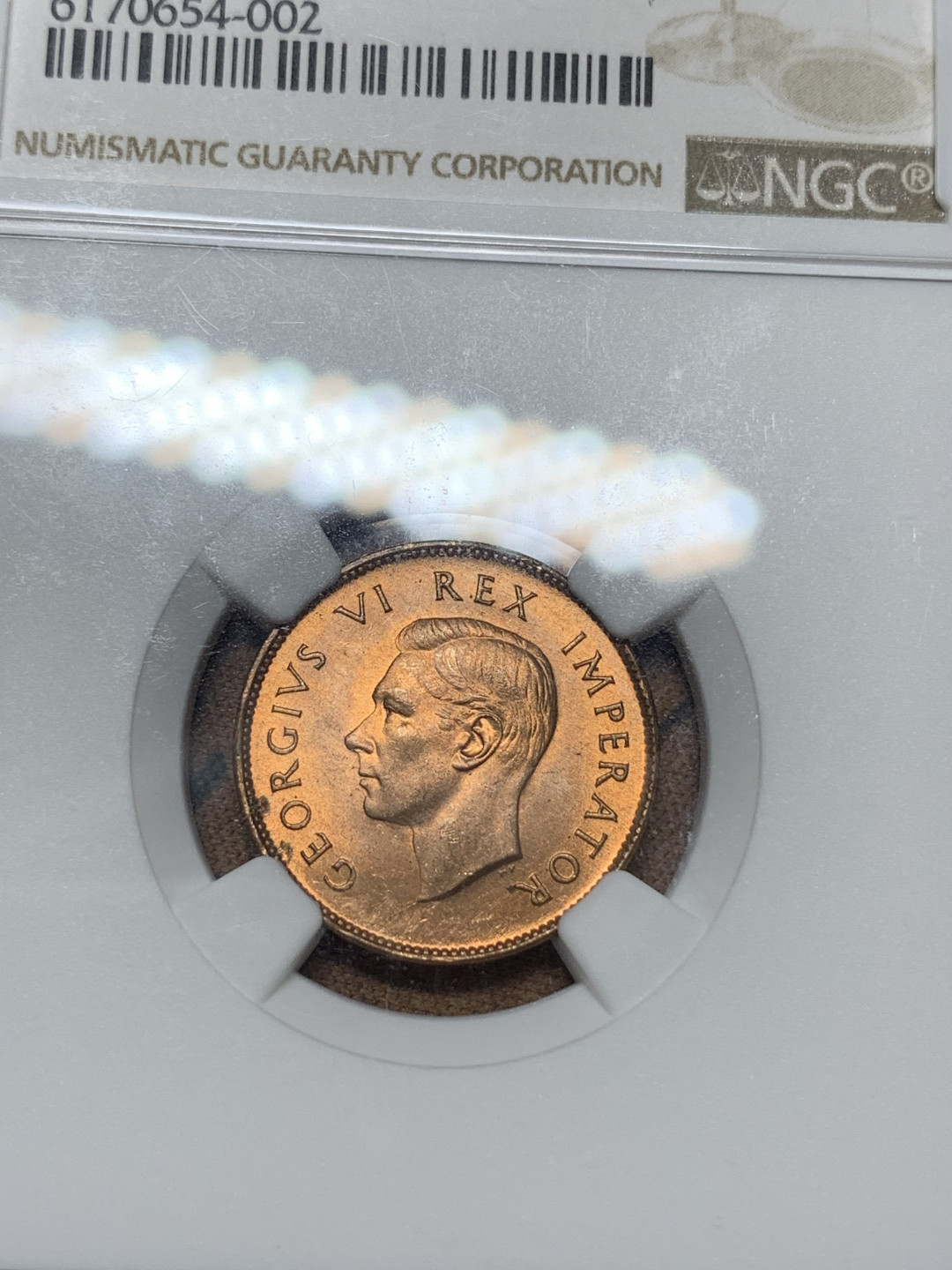 《竞宝斋》钱币微拍-第25场-本周日，周一2场连拍（全场顺丰包邮） NGC-MS65RD 英属南非 乔治六世 1947年1/4便士铜币 红光好品