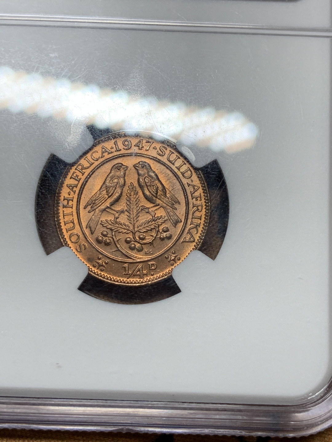 《竞宝斋》钱币微拍-第25场-本周日，周一2场连拍（全场顺丰包邮） NGC-MS65RD 英属南非 乔治六世 1947年1/4便士铜币 红光好品