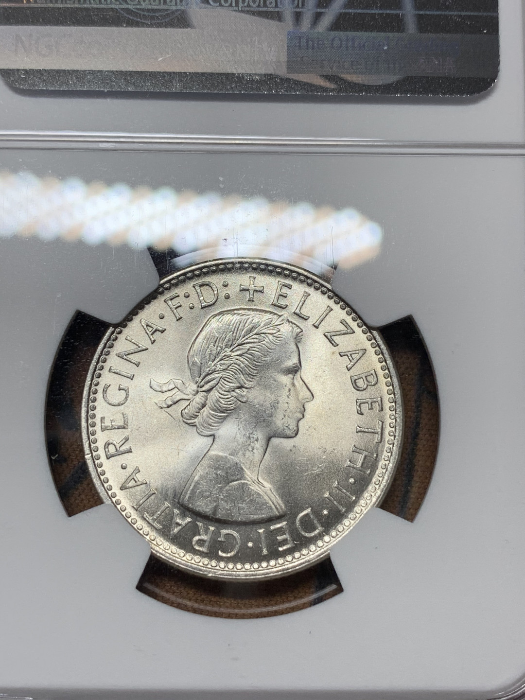《竞宝斋》钱币微拍-第25场-本周日，周一2场连拍（全场顺丰包邮） NGC-MS64 澳大利亚 伊丽莎白二世 1960年弗洛林银币 品相极好 该币背面比正面更有吸引力 故NGC将币反置