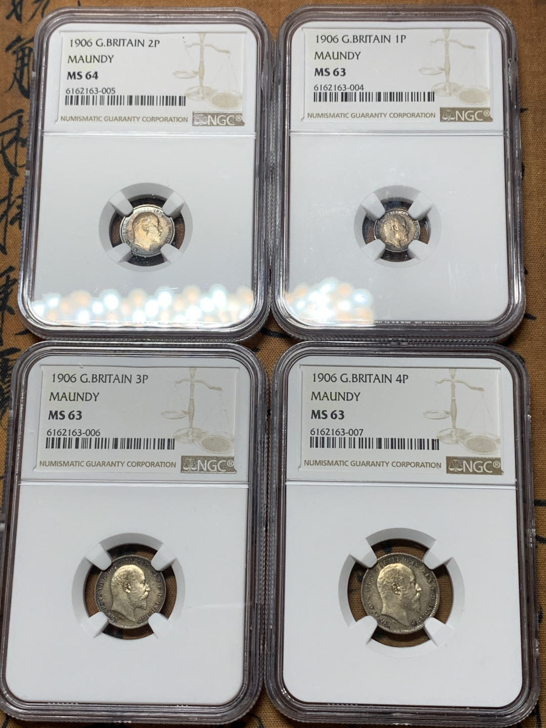 《竞宝斋》钱币微拍-第25场-本周日，周一2场连拍（全场顺丰包邮） NGC-MS63~64 英国 爱德华七世 1906年濯足节套币 1--4便士 底板镜面感 状态远超63分 包浆诱人，严重低评