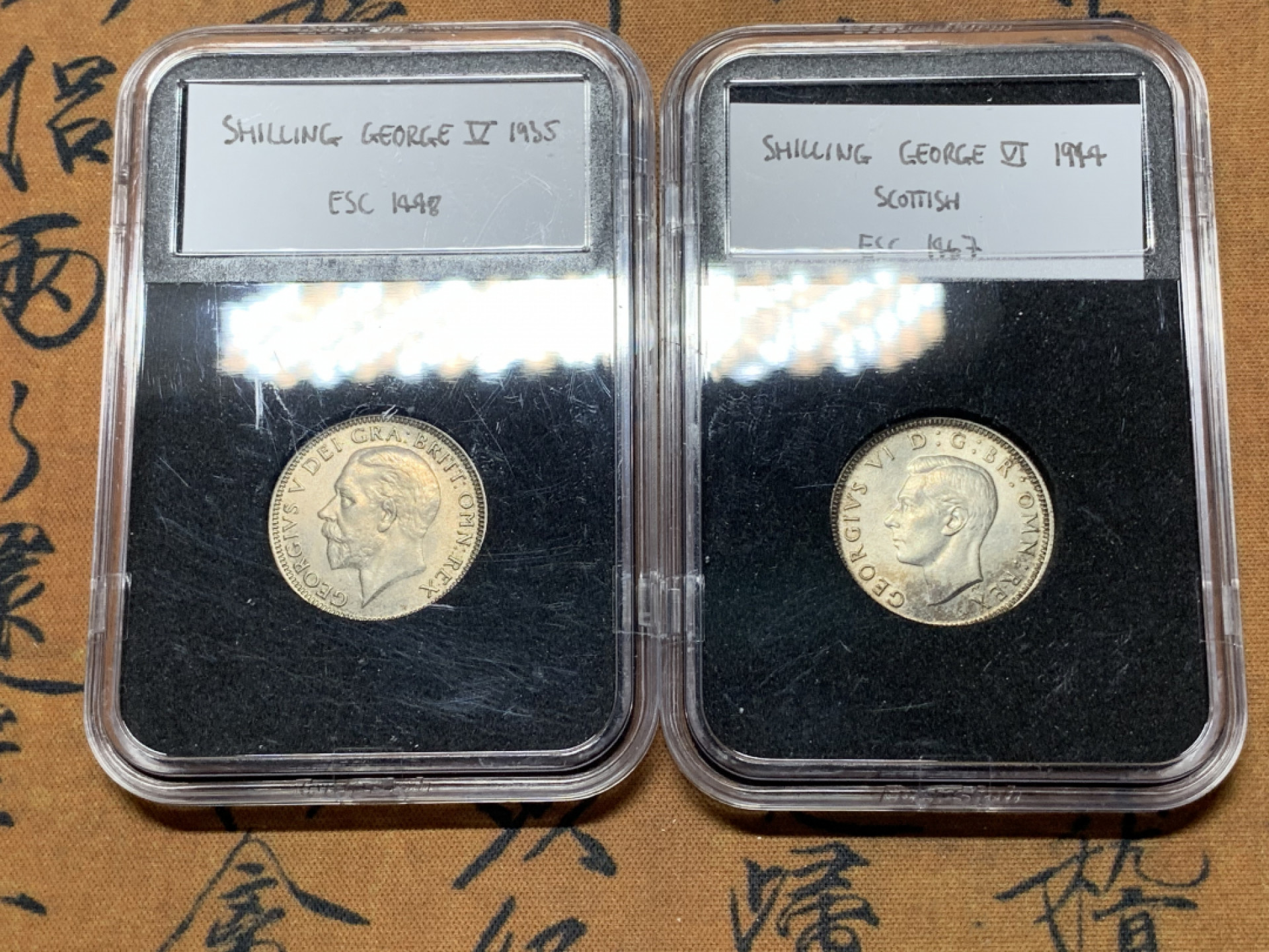 《竞宝斋》钱币微拍-第25场-本周日，周一2场连拍（全场顺丰包邮） 1944 乔六 1935 乔五 先令一对 UNC（500银5.66g*2）