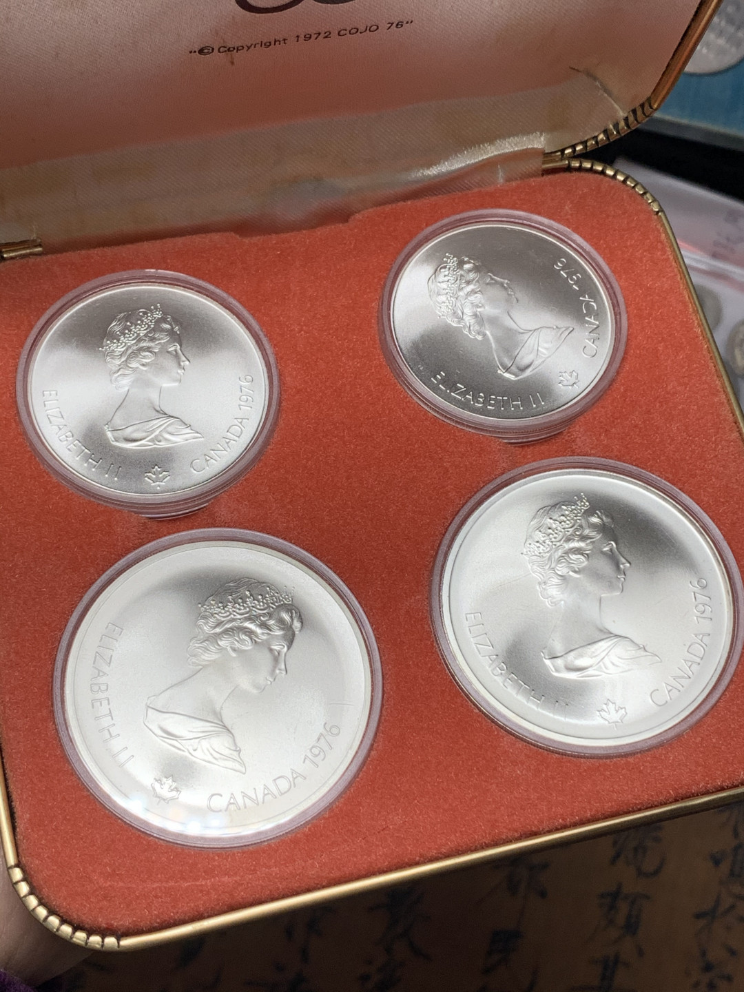 《竞宝斋》钱币微拍-第25场-本周日，周一2场连拍（全场顺丰包邮） 1976加拿大奥运会纪念大银币一套4枚一共重145.8克925高银 45年前的原盒币全网在售就此一套