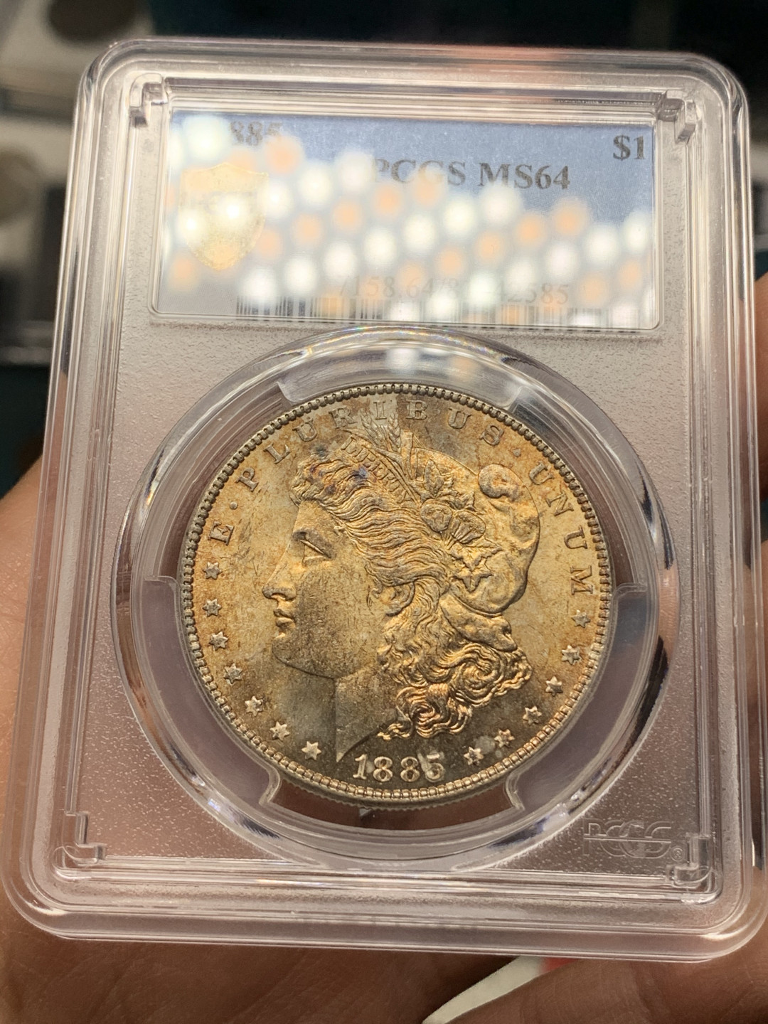 《竞宝斋》钱币微拍-第25场-本周日，周一2场连拍（全场顺丰包邮） PCGS-MS64 美国 1885年 摩根银币 正面黄金彩