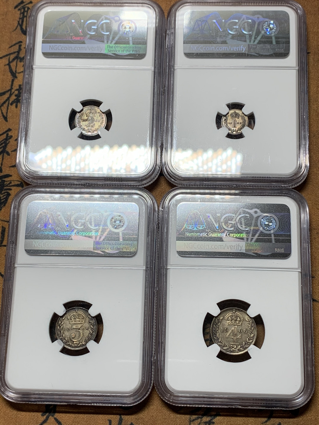 《竞宝斋》钱币微拍-第25场-本周日，周一2场连拍（全场顺丰包邮） NGC-MS63~64 英国 爱德华七世 1906年濯足节套币 1--4便士 底板镜面感 状态远超63分 包浆诱人，严重低评