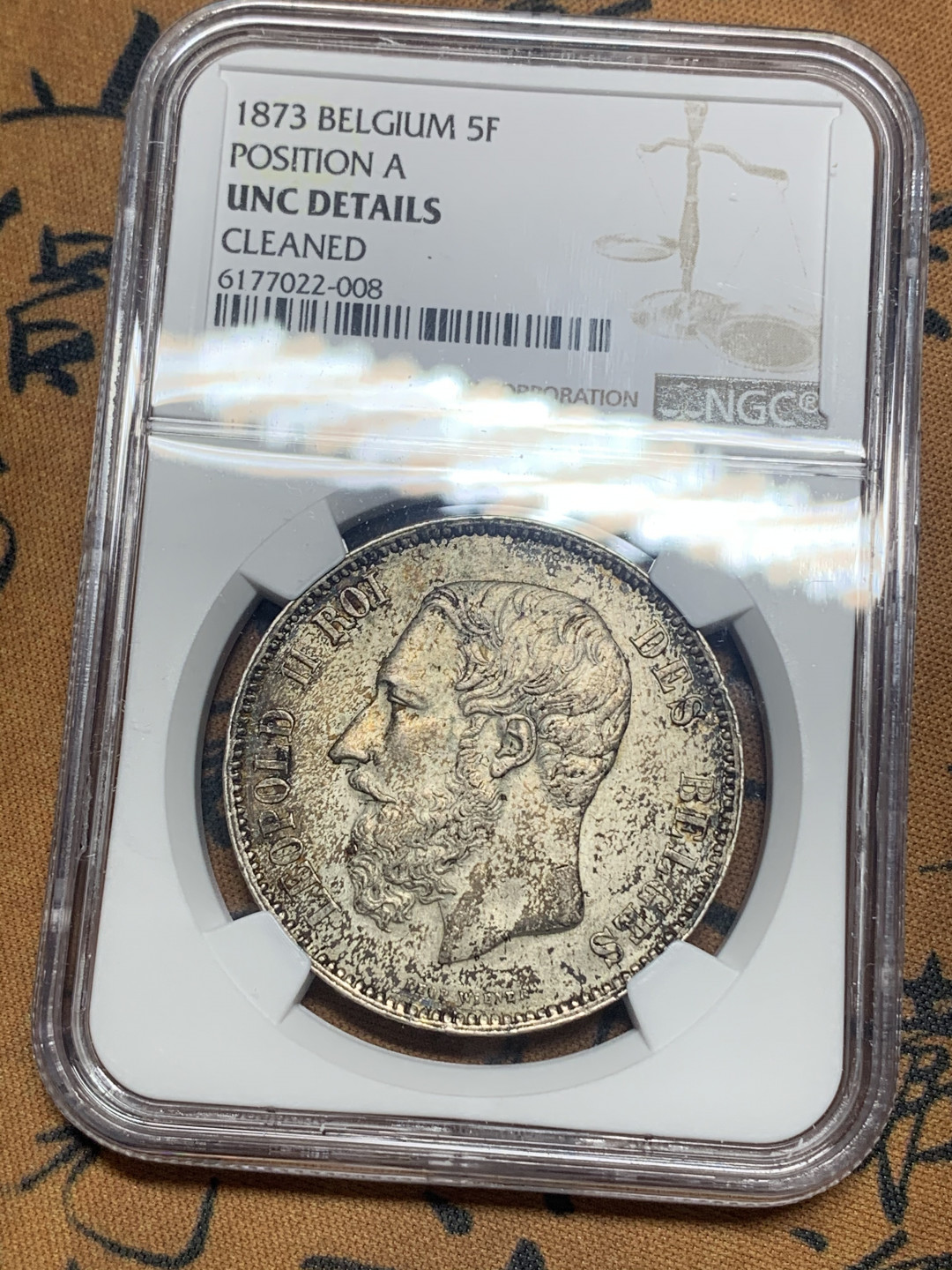 《竞宝斋》钱币微拍-第26场 元旦特刊（全场顺丰包邮） NGC-UNC 比利时 1873年 利奥波德二世 5法郎 大银币 酱彩带光 现在这样的包浆上海一律枪毙 美国本土给分