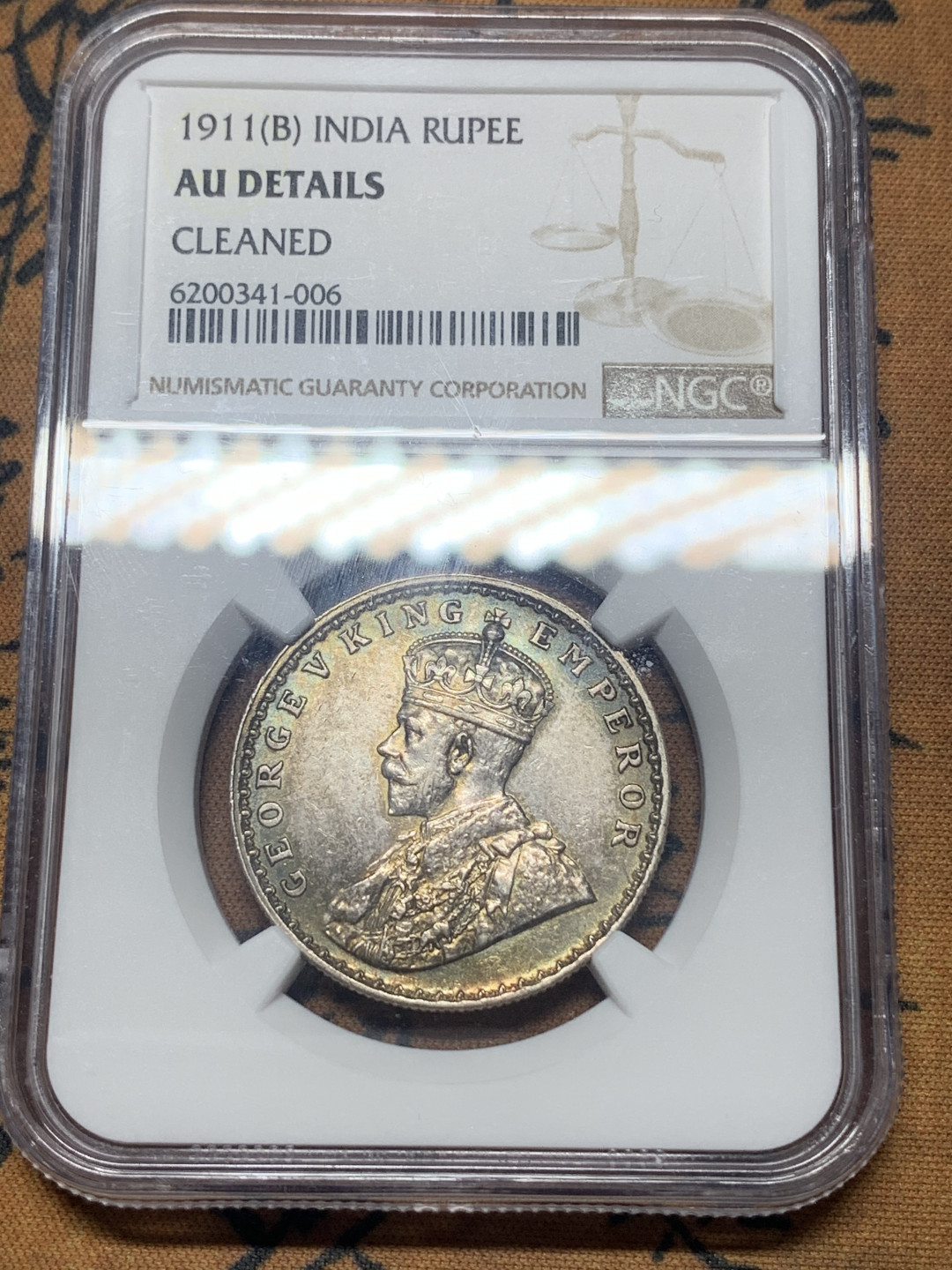 《竞宝斋》钱币微拍-第26场 元旦特刊（全场顺丰包邮） NGC-AU 英属印度 乔治五世 1911年B版1卢比银币 猪卢比银币 正面币周带有五彩包浆 