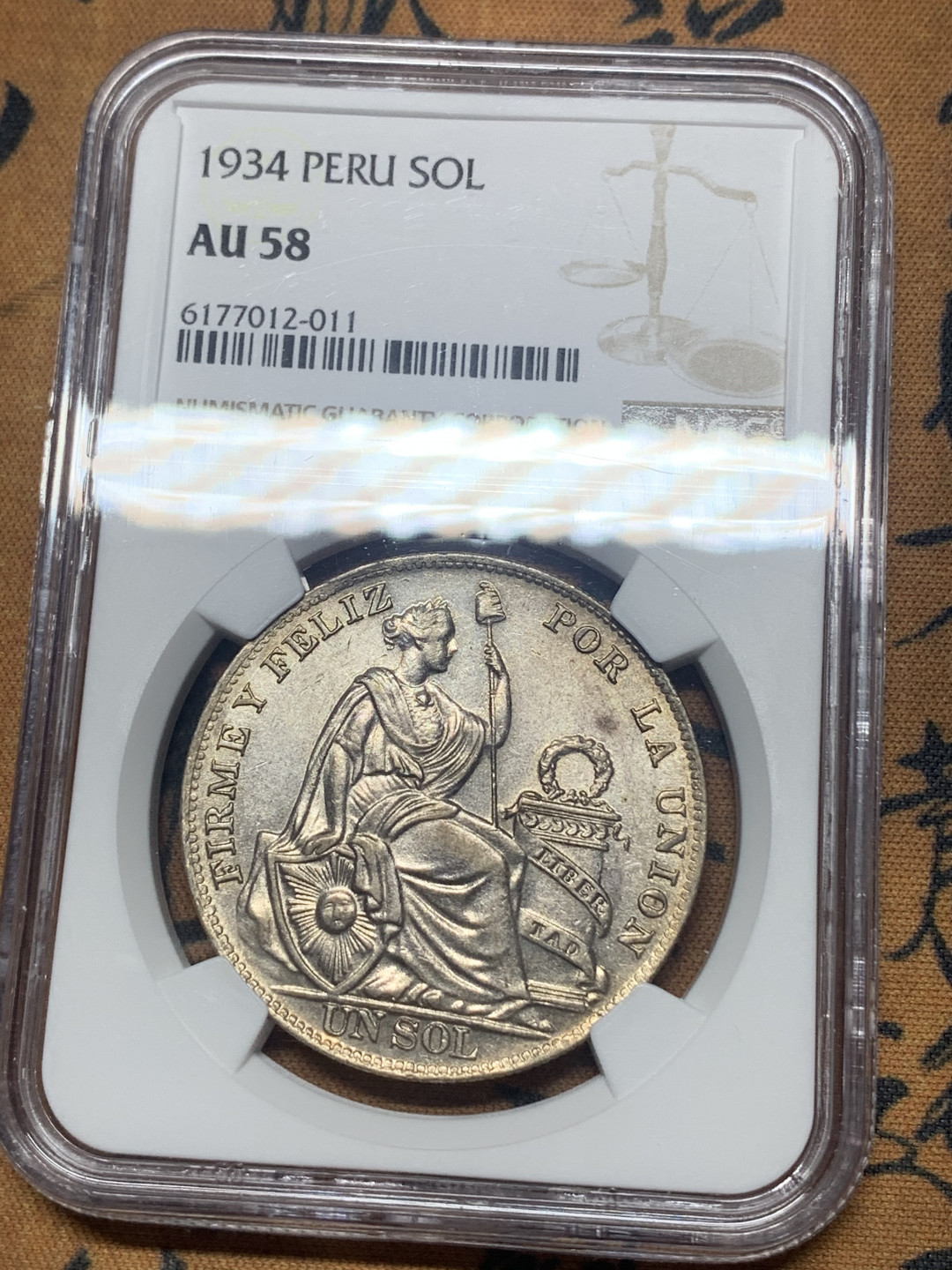 《竞宝斋》钱币微拍-第26场 元旦特刊（全场顺丰包邮） NGC-AU58 秘鲁 1934年 坐人 1索尔 原光大银币