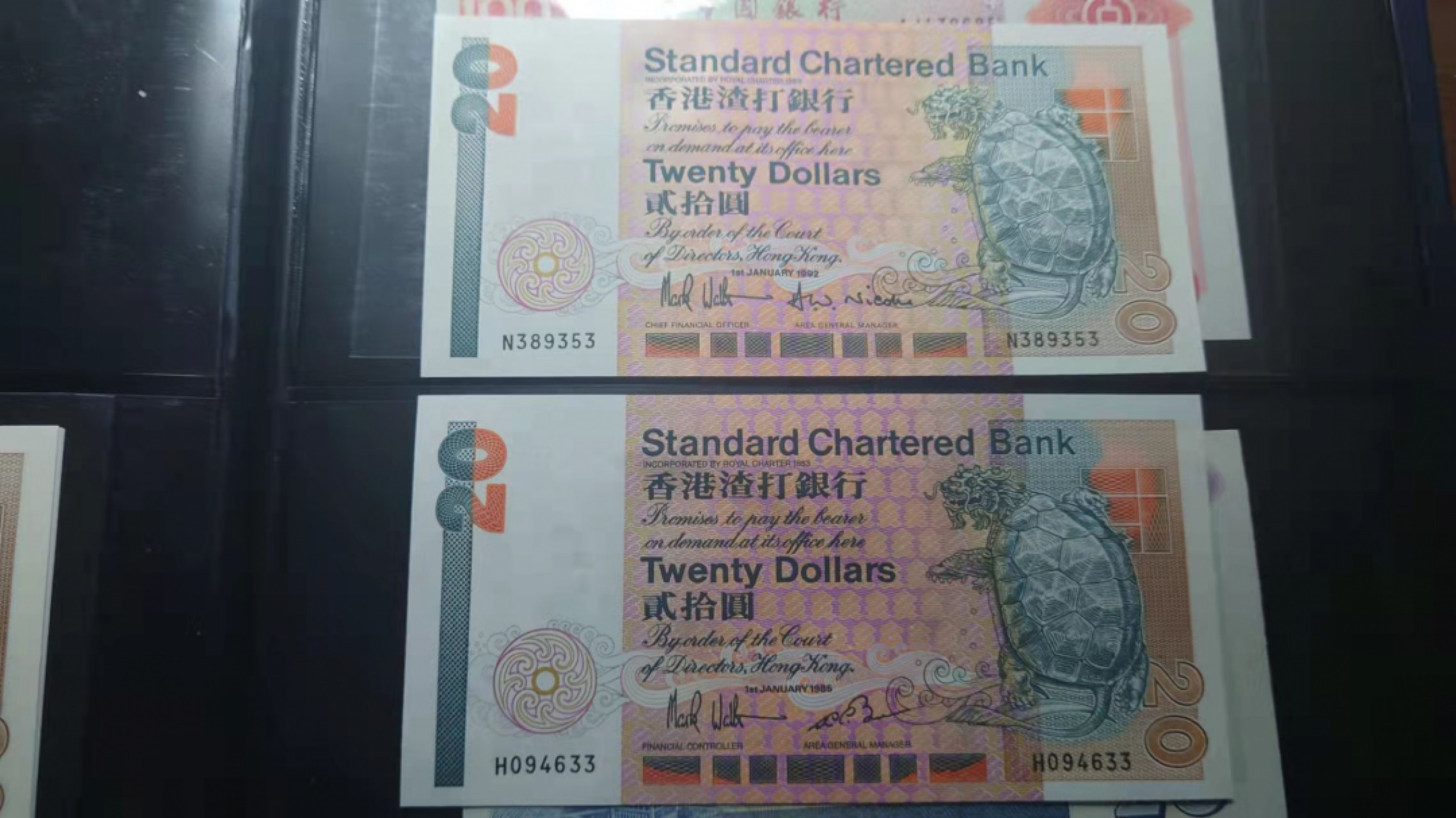 1.10晚群里有新品看下方预告群里先卖【囧羊收藏】精选微拍第44期暨2022年第一期  世界钱币精选 1985+1992年香港渣打银行20元长棍 全新UNC