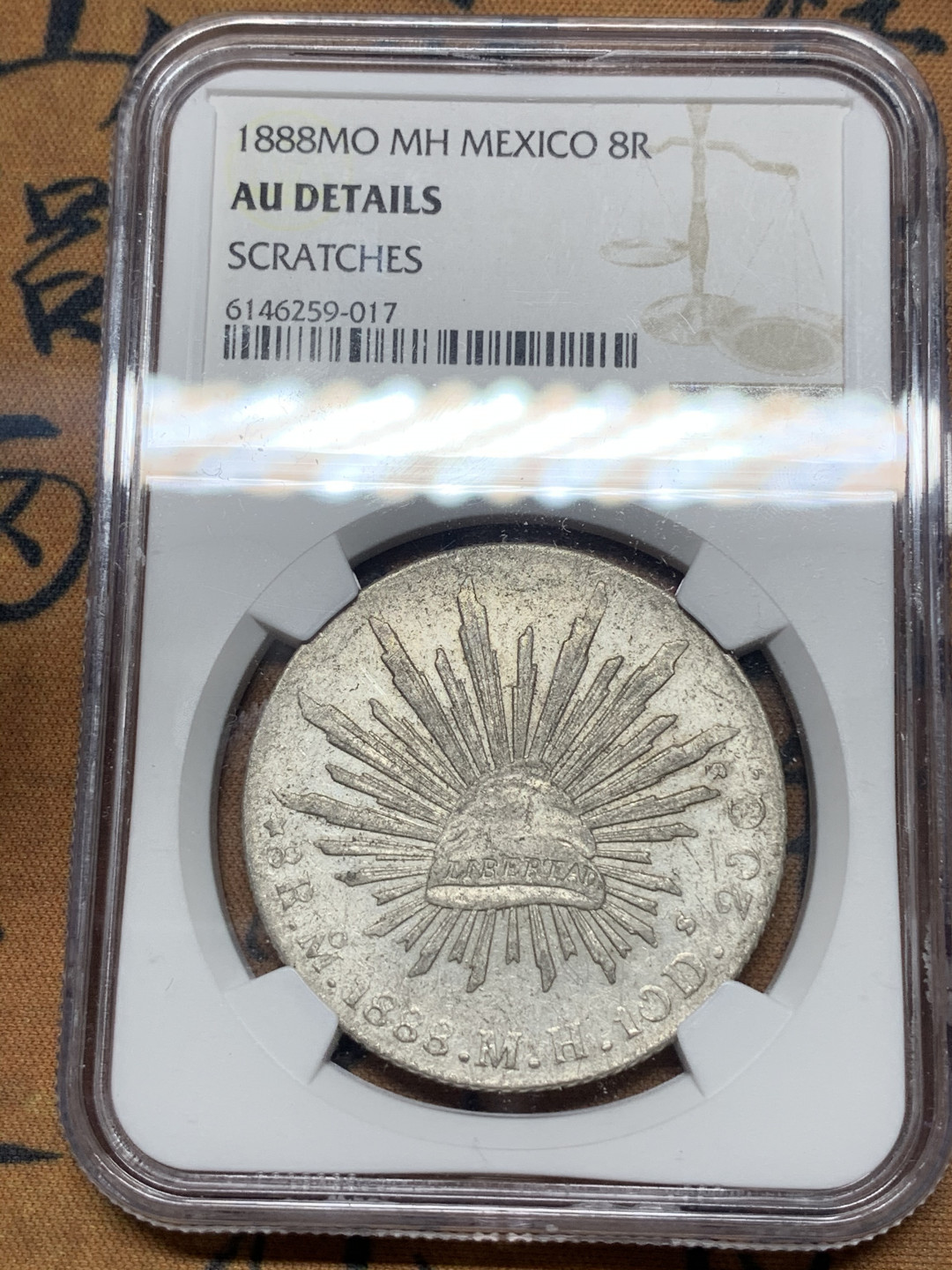 《竞宝斋》第27场-本周日，周一2场连拍（全场顺丰包邮） NGC-AUD   墨西哥 1888年 8 里亚尔   墨西哥厂  银币     原味mo厂老鹰 吉祥年份