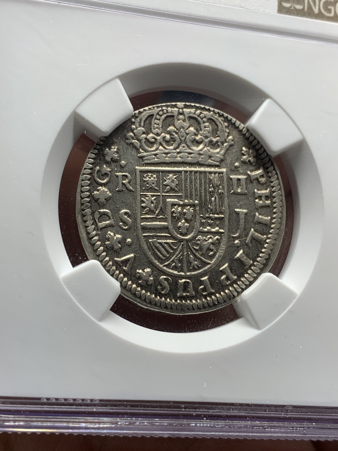 《竞宝斋》第27场-本周日，周一2场连拍（全场顺丰包邮） NGC XF45 西班牙 1725 2里亚尔 菲利普五世银币 塞维利亚厂 铸纹清晰，NGC低评AU以上级别！