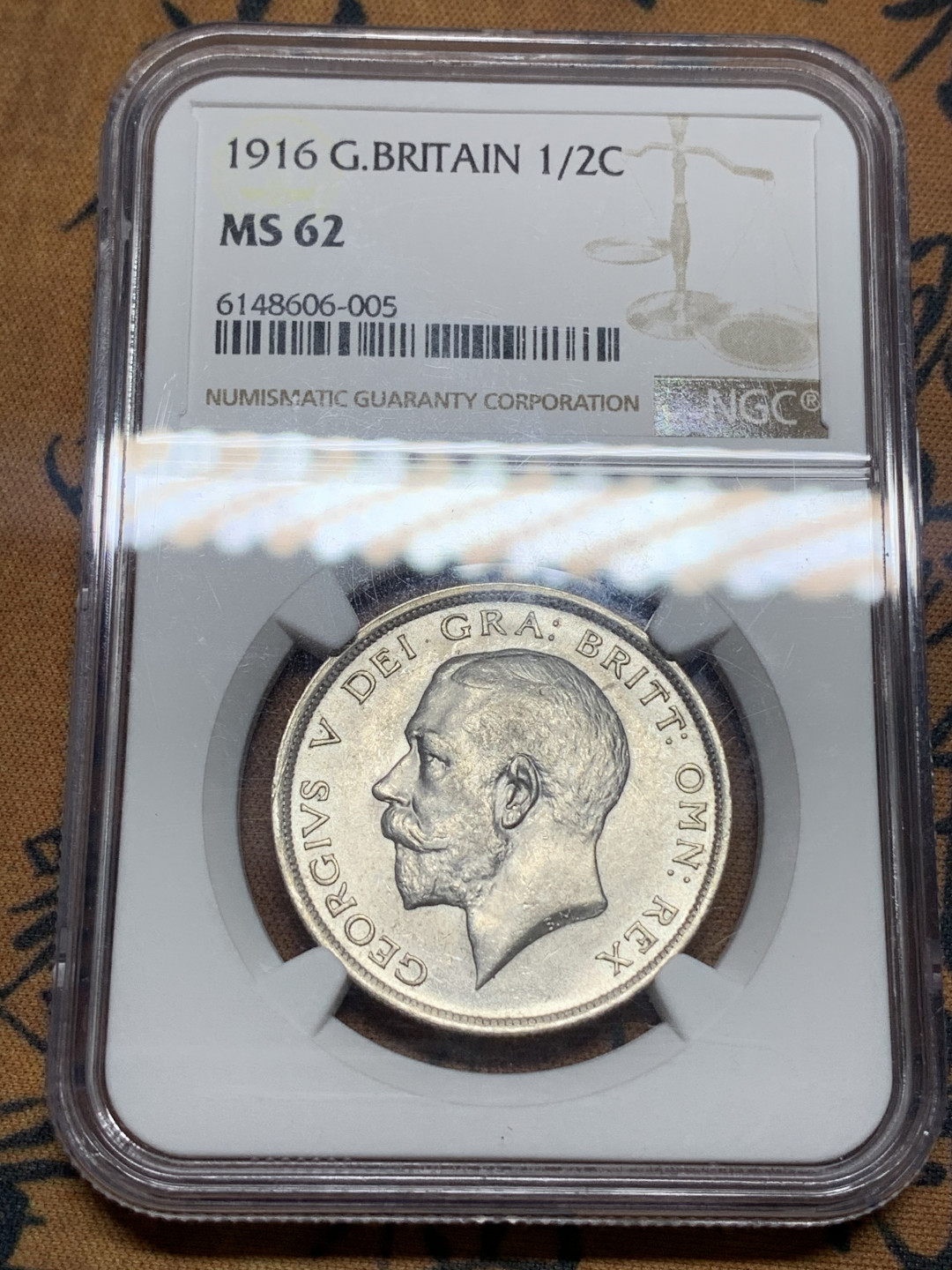 《竞宝斋》第27场-本周日，周一2场连拍（全场顺丰包邮） NGC-MS62 英国 1916年乔治五世半克朗 高银版