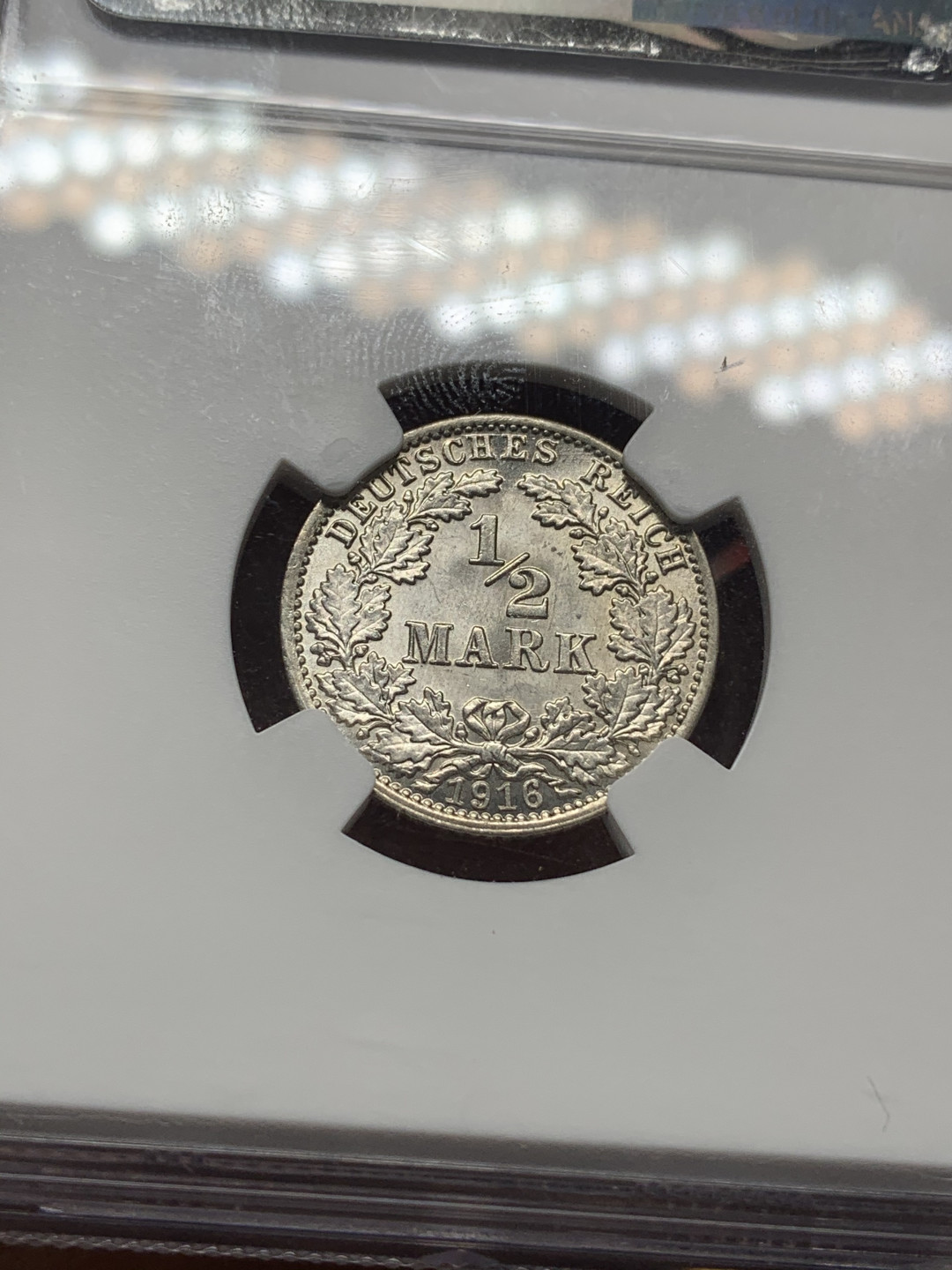 《竞宝斋》第27场-本周日，周一2场连拍（全场顺丰包邮） NGC-MS64 德国 1916年A厂1/2马克