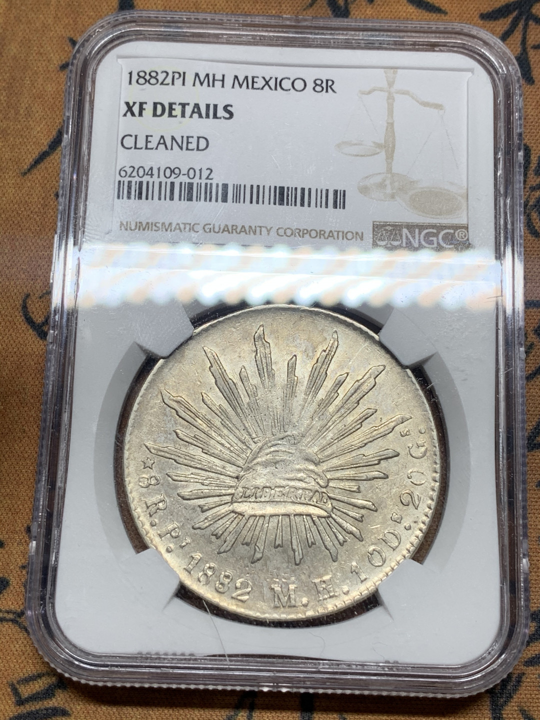 《竞宝斋》第27场-本周日，周一2场连拍（全场顺丰包邮） NGC-XFD  1882 墨西哥鹰洋 8 里亚尔 波多西厂  原味五彩