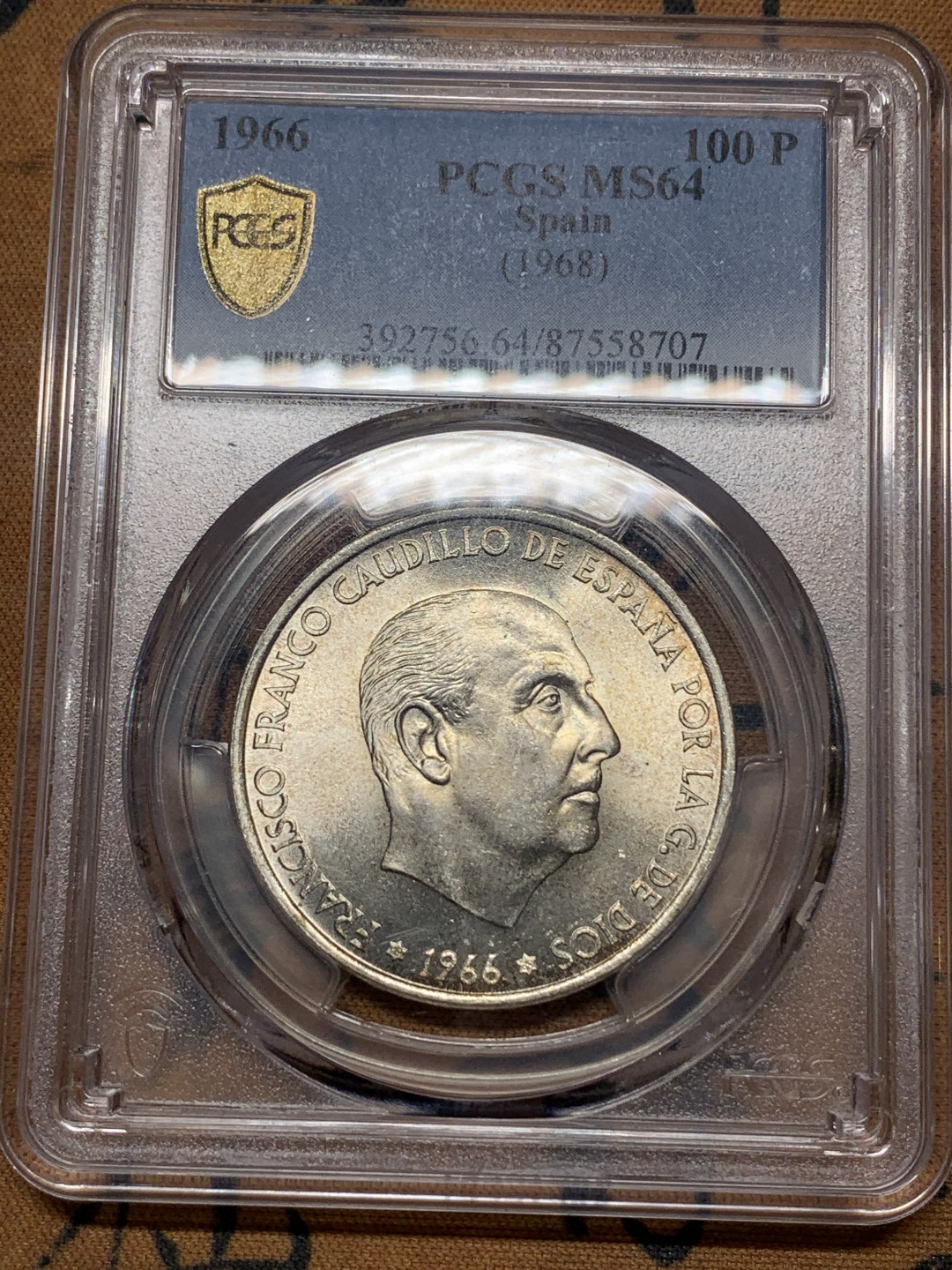 《竞宝斋》第27场-本周日，周一2场连拍（全场顺丰包邮） PCGS MS64 1966 西班牙 100比塞塔 佛朗哥银币 带彩转光