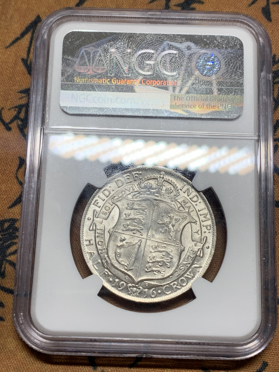 《竞宝斋》第27场-本周日，周一2场连拍（全场顺丰包邮） NGC-MS62 英国 1916年乔治五世半克朗 高银版