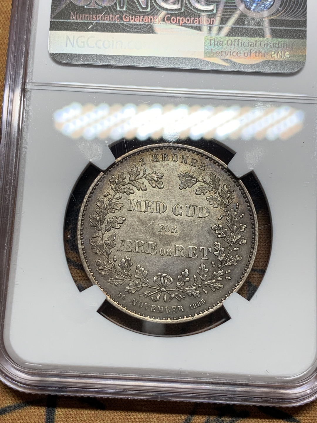 《竞宝斋》第28场-本周日，周一2场连拍（全场顺丰包邮） NGC UNC评级 少见 丹麦 1888年 2克朗银币 老包浆挺吃亏 发丝无磨损 喜欢的不要错过