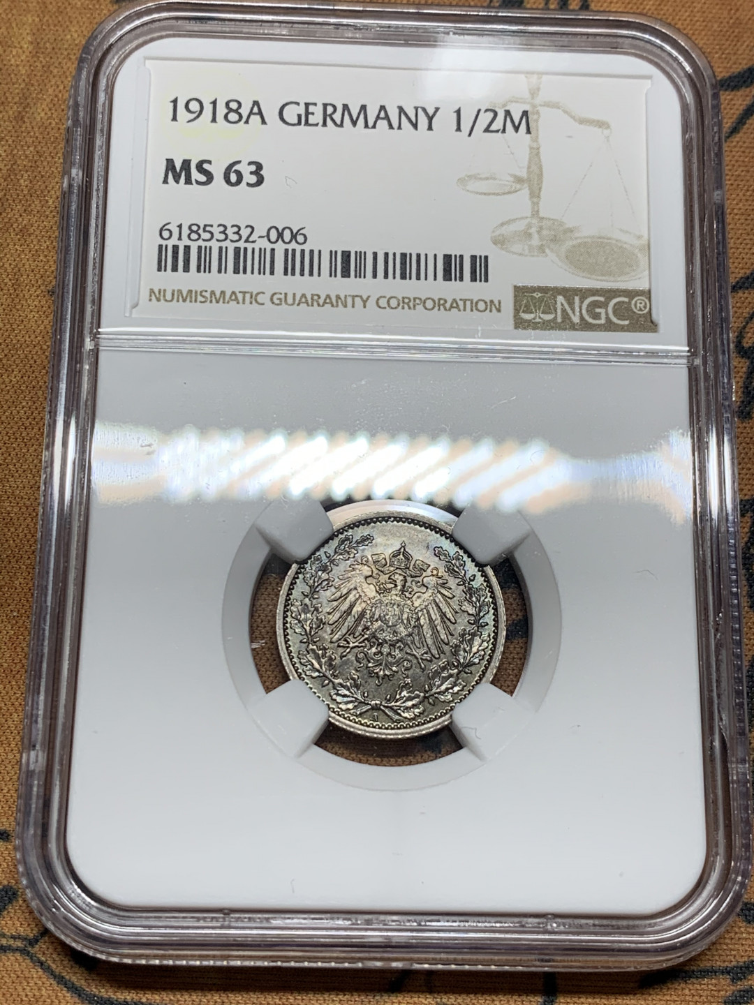 《竞宝斋》第28场-本周日，周一2场连拍（全场顺丰包邮） NGC MS63 德国1918年 深五彩 1/2马克 银币