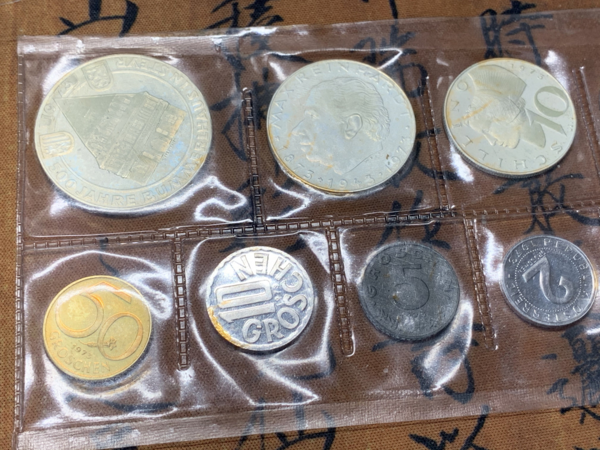 《竞宝斋》第28场-本周日，周一2场连拍（全场顺丰包邮） 原封装 奥地利 1973年 9枚套精制币 其中三枚大的是银币