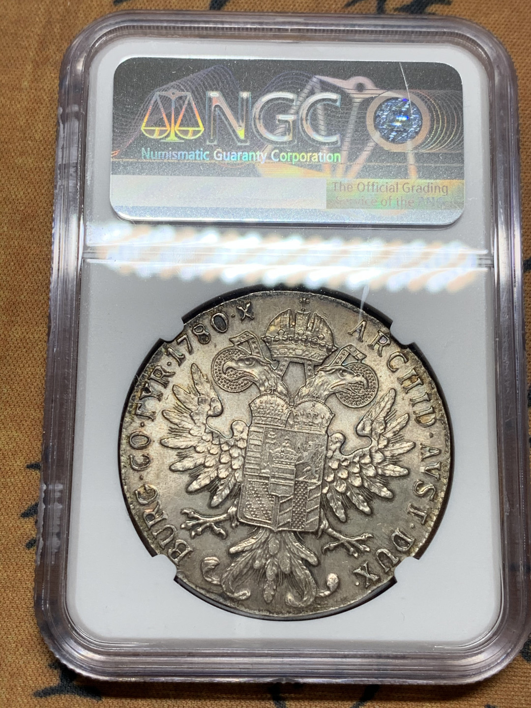 《竞宝斋》第28场-本周日，周一2场连拍（全场顺丰包邮） NGC MS64 难得给分的 奥地利 五彩 大奶妈 泰勒银币 自从国评出镀银之后  N基本不给入盒了 值得收藏