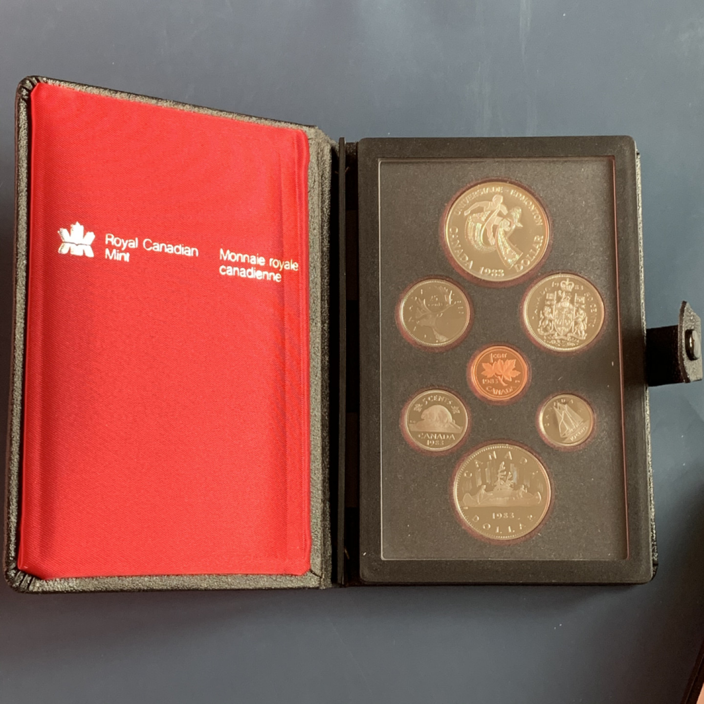 《竞宝斋》第28场-本周日，周一2场连拍（全场顺丰包邮） 原装证书 加拿大 1983年 大学运动会 7枚套精铸币 一元是银币