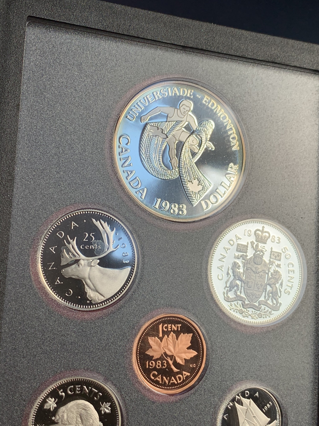 《竞宝斋》第28场-本周日，周一2场连拍（全场顺丰包邮） 原装证书 加拿大 1983年 大学运动会 7枚套精铸币 一元是银币