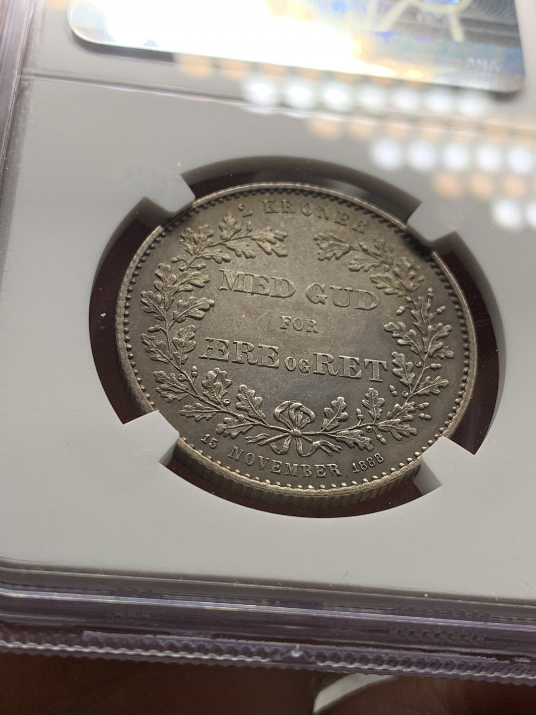 《竞宝斋》第28场-本周日，周一2场连拍（全场顺丰包邮） NGC UNC评级 少见 丹麦 1888年 2克朗银币 老包浆挺吃亏 发丝无磨损 喜欢的不要错过