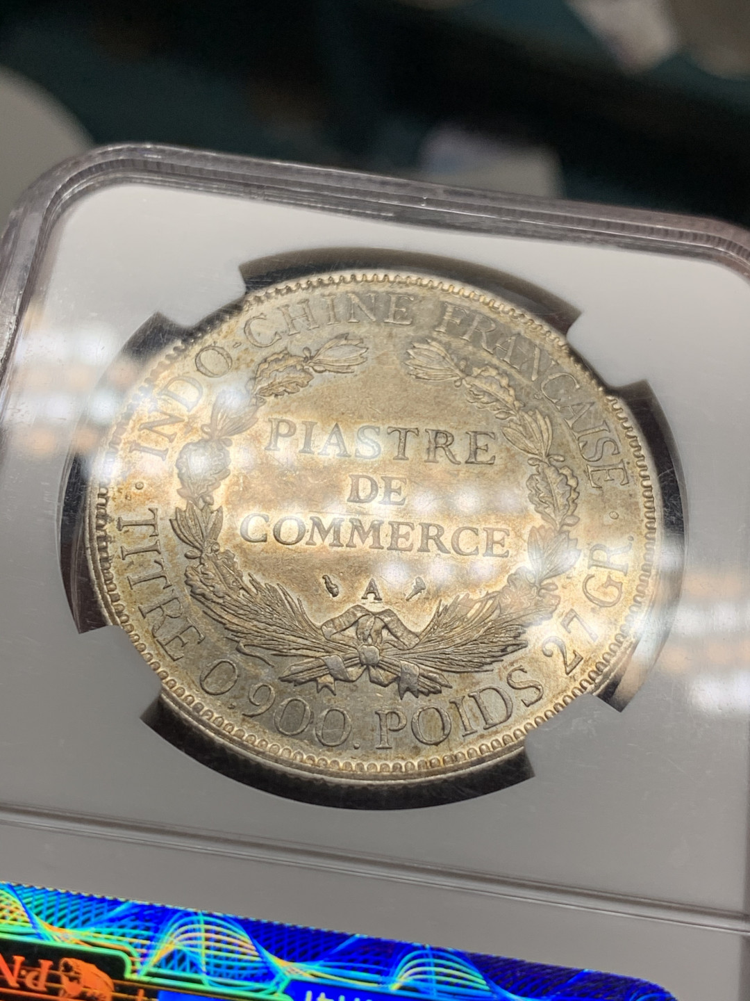 《竞宝斋》第28场-本周日，周一2场连拍（全场顺丰包邮） NGC-AUD92  法属印度支那1907年坐洋银币  全脸高鼻 金彩包浆 状态好