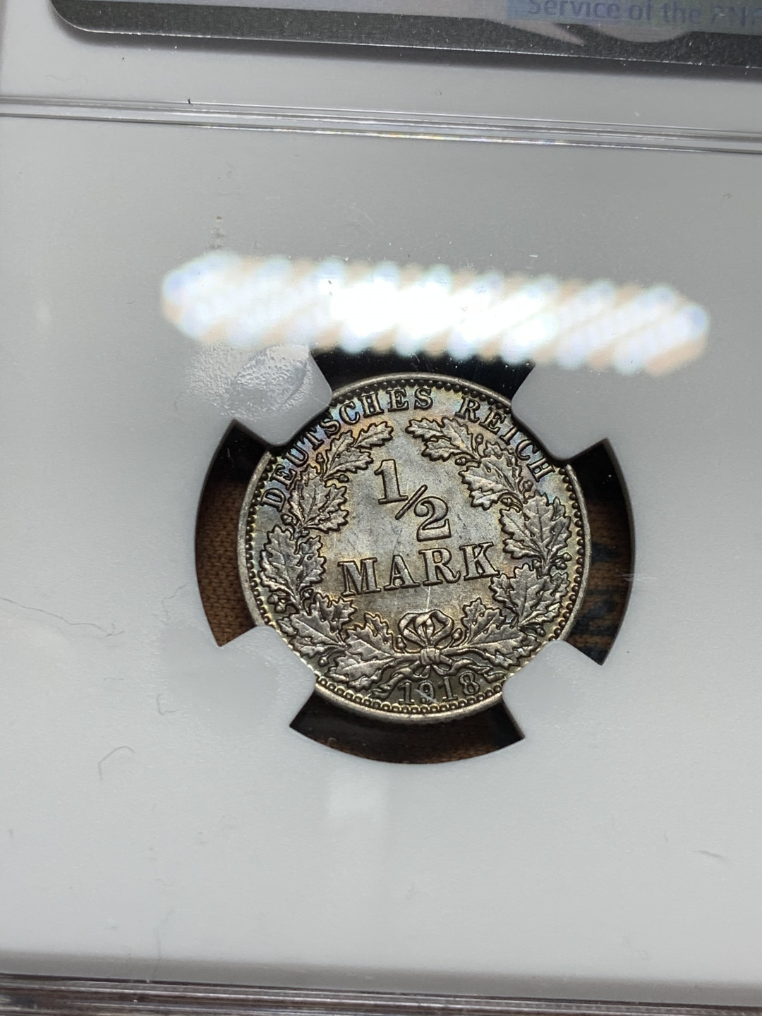 《竞宝斋》第28场-本周日，周一2场连拍（全场顺丰包邮） NGC MS63 德国1918年 深五彩 1/2马克 银币