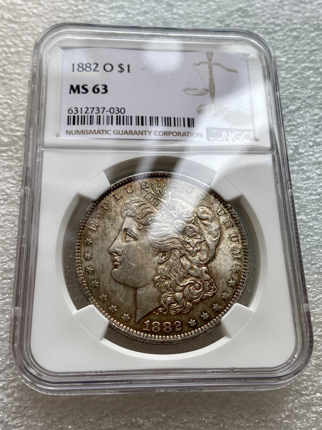 【Numismatist】第四场-0起拍-0佣金-包邮-世界硬币 美国1882年摩根银币O版 NGC评级MS63分 双面均匀彩 很漂亮