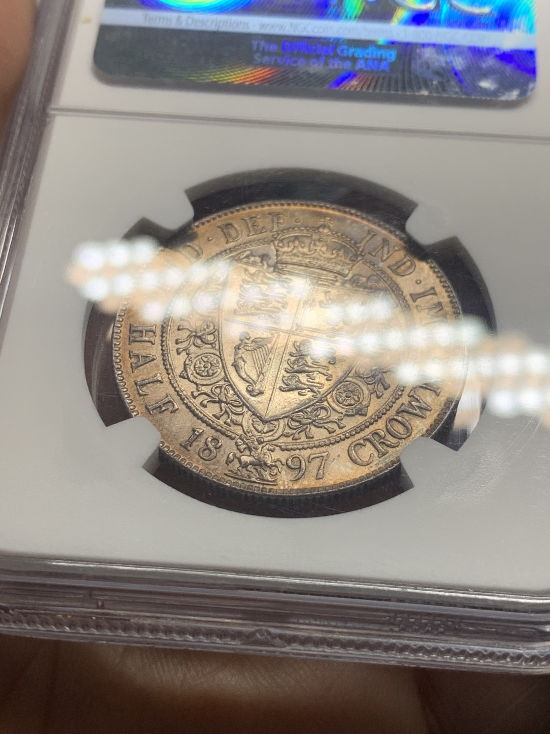 《竞宝斋》第30场-周日，周一，周二3场连拍（全场顺丰包邮） NGC-MS64 英国 1897年  维多利亚披纱 半克朗 银币 五彩包浆 十字光轮