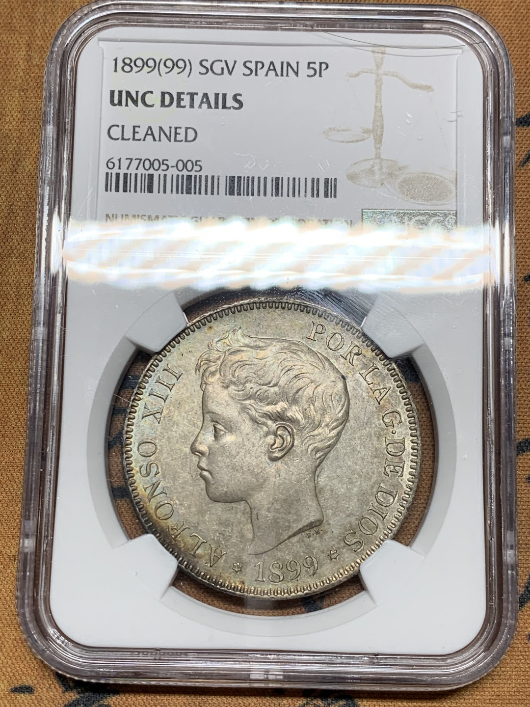 《竞宝斋》第30场-周日，周一，周二3场连拍（全场顺丰包邮） NGC-UNC 西班牙 1899年 阿方索十三世 5比塞塔双柱银币 老包浆带彩的不给分上海NGC的规矩