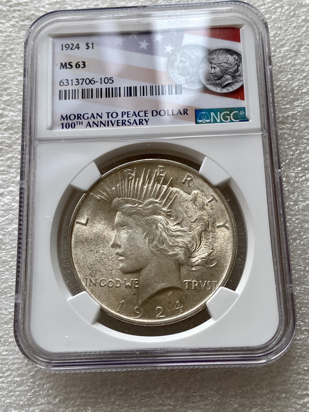 【Numismatist】第四场-0起拍-0佣金-包邮-世界硬币 美国1924年和平银币 NGC评级MS63分 美国本土百年纪念标签 少见 